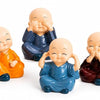 Set of 4 Baby Monk Statues for Home Decor | See No Evil, Hear No Evil, Speak No Evil & Smile Figurines | Resin Buddha Showpiece